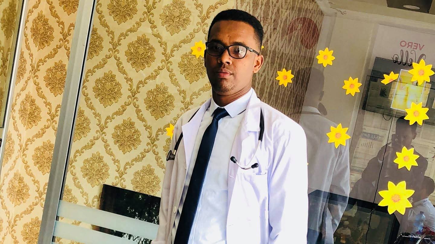 Dr Abdirashid Hassan standing at the Kaalmo clinic entrance